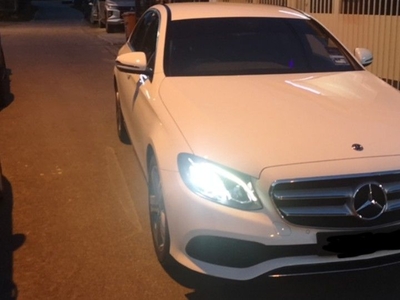 Mercedes E-Class with driver