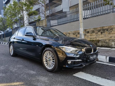 Bmw 318i LUXURY (CKD) FACELIFT on the road