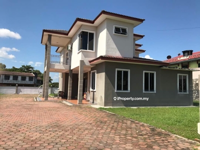 Double storey bungalow with large land for sale