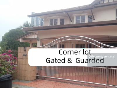 Gated and guarded, corner lot